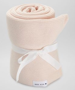 Couverture en maille tricot - Rose